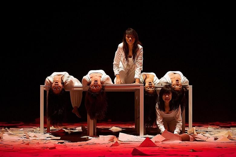 Ms Sim (third from left) performing in a production of Kuo Pao Kun's The Spirits Play. After her A levels in 2013, she shelved her pursuit of a degree to explore her passion in theatre. "I am more focused in university now because I have a clearer s