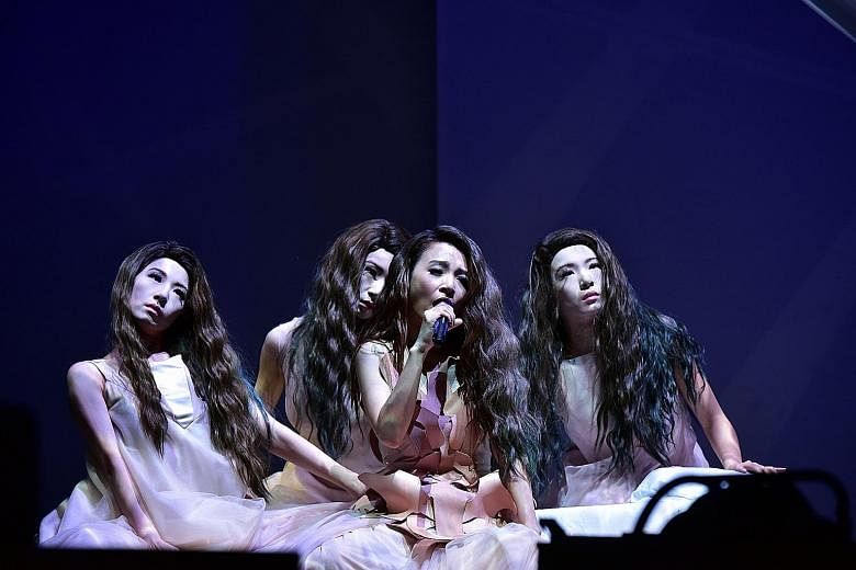 Dancers were dressed up to look like singer Hebe Tien (third from far left) in a segment of the concert.