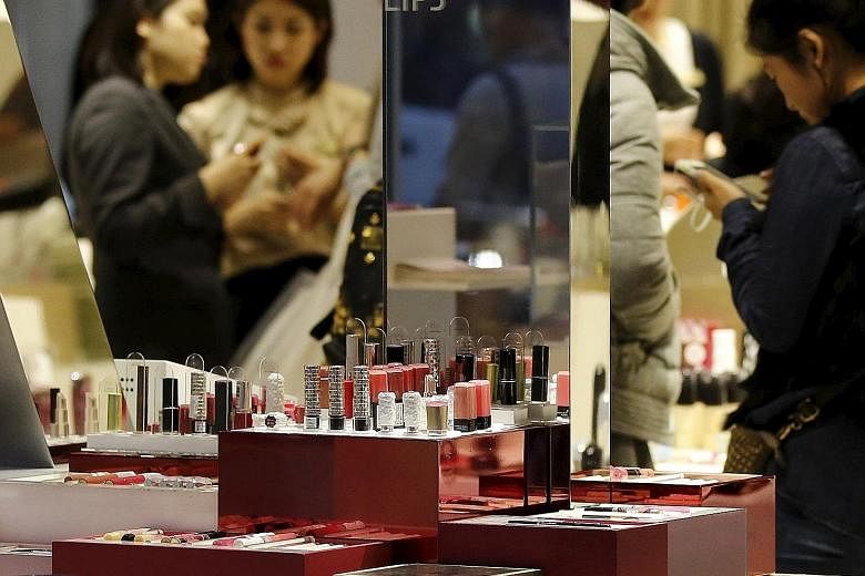 Lipsticks at a Shiseido store in Tokyo. As optimism about a recovery in Japan's economy fades, sales are shifting from hot red hues to shades closer to natural Japanese lip colour.