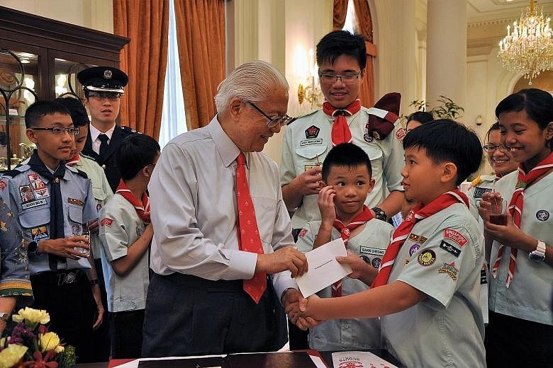 The Istana received a helping hand with its chores from young Scouts yesterday at the launch of the Singapore Scout Association's Job Week. The little helpers did housekeeping jobs around the President's residence such as polishing silverware and wip