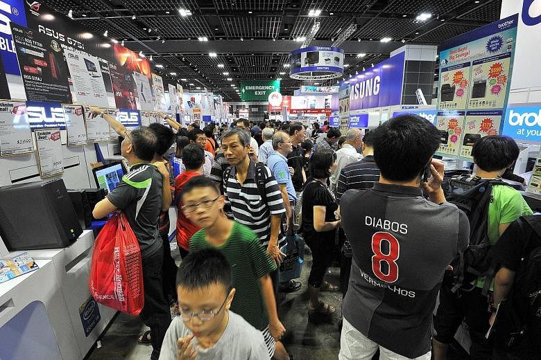 The crowds at last year's IT Show. At this year's four-day event, consumers can indicate their interest in fibre broadband operator MyRepublic's mobile plans. The firm is eyeing the chance to become Singapore's fourth telco.