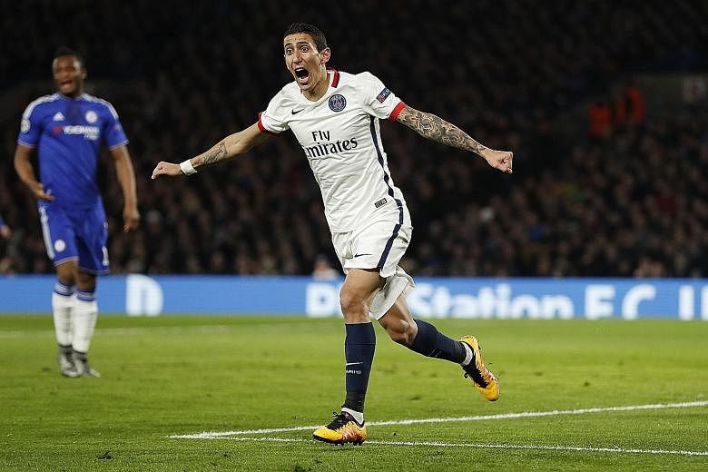 Angel di Maria celebrating Paris Saint-Germain's first goal against Chelsea in the Champions League last-16 second-leg tie. The Argentinian was involved in both of PSG's goals in their 2-1 victory at Stamford Bridge.