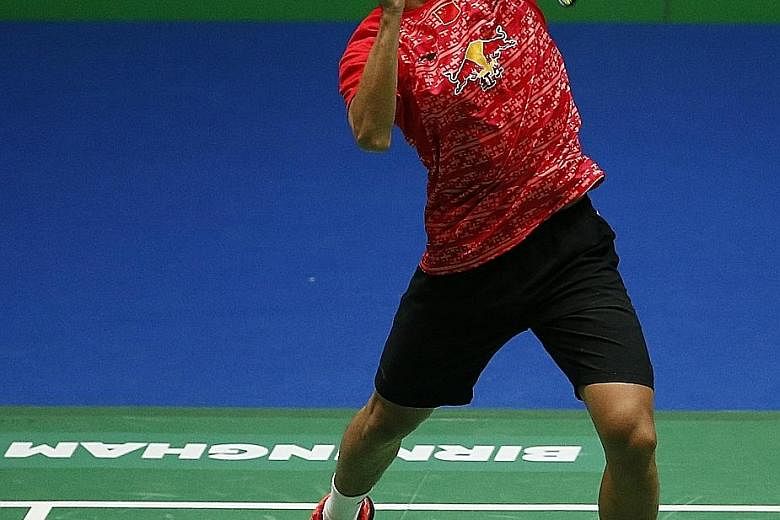 Lin Dan hitting a return during his quarter-final win over Jan Jorgensen. The Chinese shuttler, who will face compatriot Xue Song in the semi-finals, said: "I'm really excited with the win."