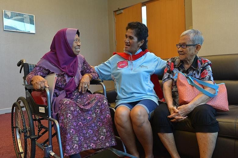 As a volunteer in the Neighbours for Active Living programme, Ms Nekmah Mahadi (centre) helps and keeps an eye on her elderly neighbours, Madam Zainab Abdullah (left), 73, and Madam Tan Ah Pong, 88.