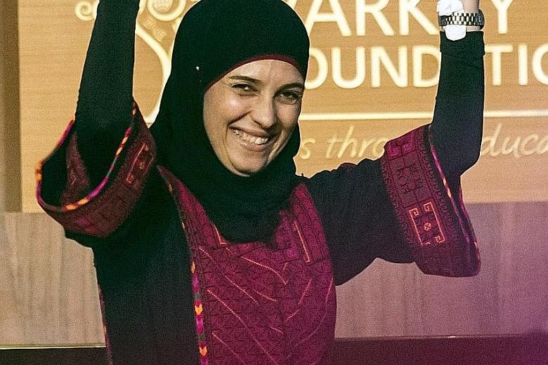 Ms Al Hroubgrew up in a refugee camp and specialises in educating and supporting refugee children.