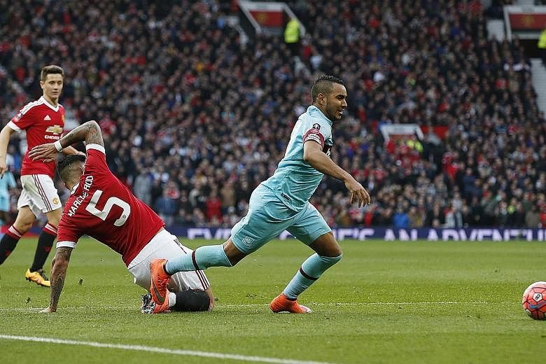 West Ham's Dimitri Payet going down in the box after a challenge from Manchester United's Marcos Rojo. Replays showed that Payet received minimal contact from the defender.