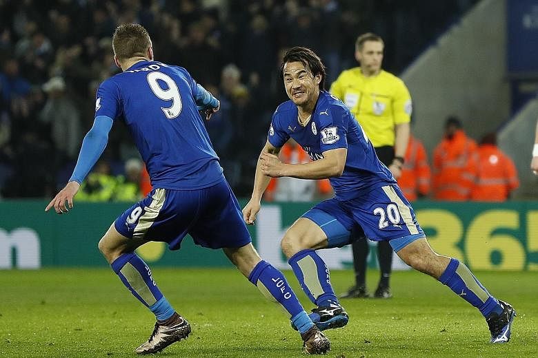 Shinji Okazaki wheels away to celebrate what turned out to be the winner with his strike partner Jamie Vardy, as Leicester City earned a 1-0 win over a Rafa Benitez-led Newcastle side. With eight games to go, Leicester are five points ahead of second