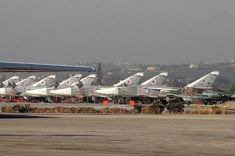 Russian jets at Hmeimim airbase in Syria last month. President Vladimir Putin announced a surprise pullout from Syria on Monday, with the UN's Syria envoy expressing hope it could help peace talks.