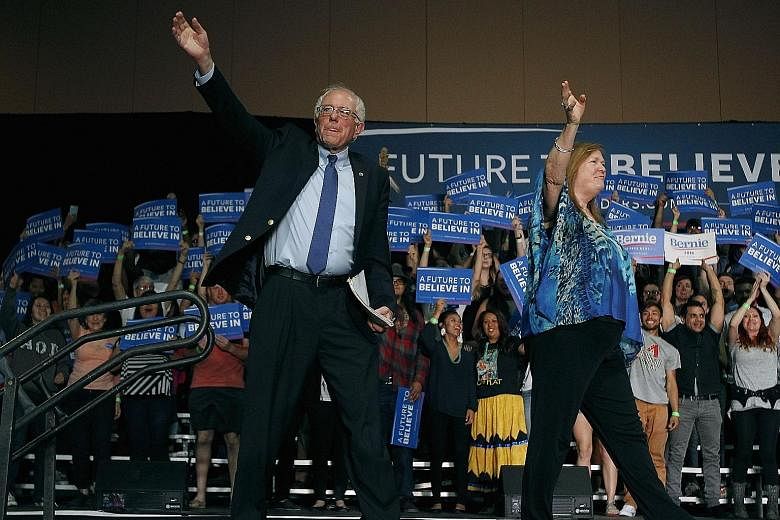 Mr Sanders in Phoenix, where his speech was apparently ignored by many cable networks as they focused on Mrs Clinton. Mrs Clinton holding a rally after winning the Florida primary on Tuesday. Her strong wins in Florida and North Carolina complete a c