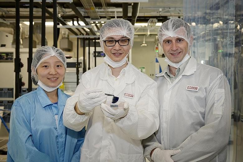 (From left): Dr Serena Lin, research scientist at the Solar Energy Research Institute of Singapore Silicon Photovoltaics Cluster, Smart research engineer Danny Ren and Massachusetts Institute of Technology Photovoltaics Research Laboratory's Prof Buo