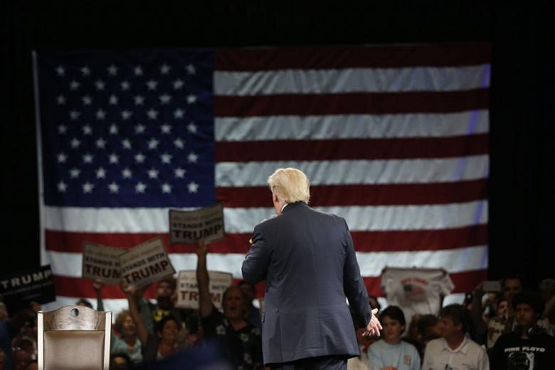 Mr Trump speaking to supporters in Florida on Monday. Exit polls of voters in the five states that held elections on Tuesday revealed a remarkable fact: Two-thirds of Republican voters back the billionaire businessman's proposal to ban Muslim immigrants a
