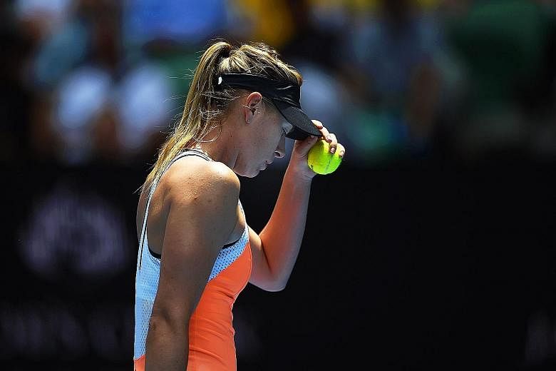 Maria Sharapova during the quarter-final loss to her nemesis, world No. 1 Serena Williams, at the Australian Open this year. The Russian failed a routine drug test later that day, after the defeat.
