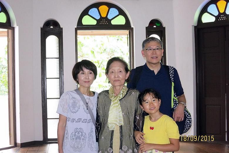Ms Yoshida (second from left) with daughter Akemi Saito, 50, granddaughter Mayu, nine, and son-in-law Hiroshi Saito, 54.