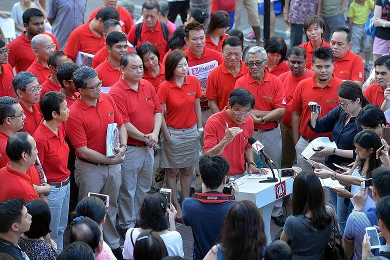 Dr Chee announcing his intention to contest the upcoming Bukit Batok by-election yesterday. He said that the SDP's goal would be to surpass the current performance levels of PAP-run town councils.
