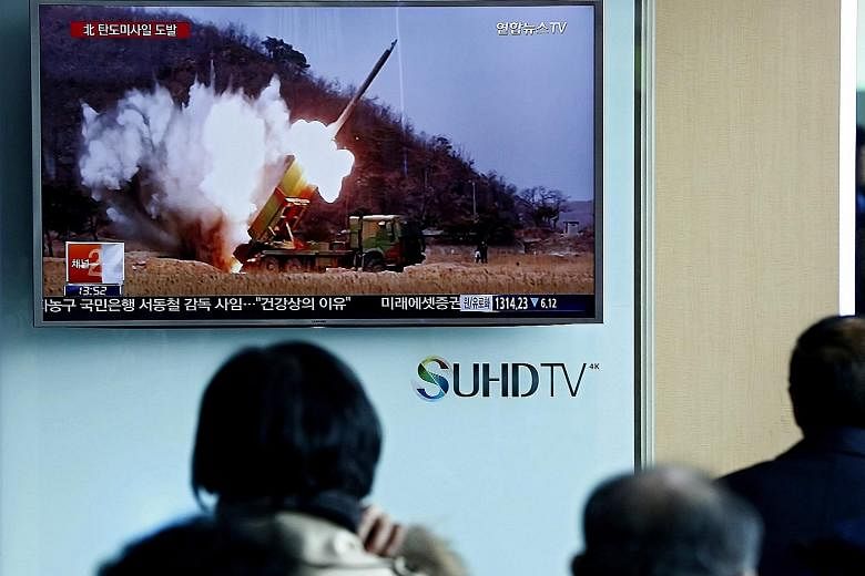 South Koreans watching news about North Korea's launch of a ballistic missile last Friday. The spate of missile launches has added urgency to an upcoming summit in Washington that will see world leaders discussing nuclear non- proliferation.