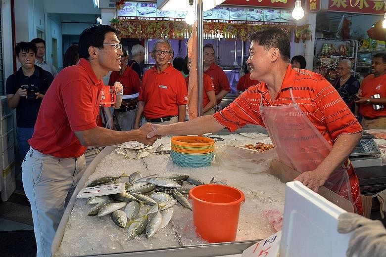 Dr Chee making his rounds in Bukit Batok on Sunday. The SDP leader is contesting in the by-election in the constituency.