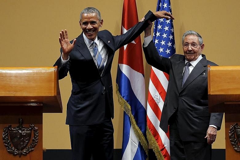 Mr Obama and Mr Castro after a news conference in Havana on Monday. The televised joint news conference began with jokes but was tense at times, with Mr Castro showing flashes of anger, especially when asked about political prisoners.