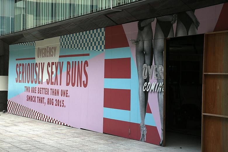 The derogatory advertisements consumers complained about last year included an ad put up by eatery OverEasy Orchard at Liat Towers that featured three scantily clad women exposing their buttocks (not shown).