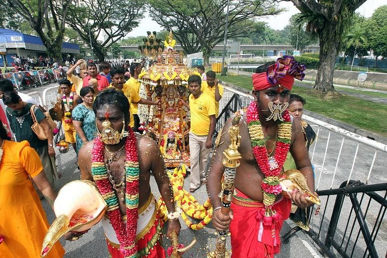 About 8,000 Hindu devotees walked nearly 2km yesterday for the annual Panguni Uthiram festival, held in honour of the Hindu god Murugan. The procession from Canberra Link to the Holy Tree Sri Balasubramaniar Temple in Yishun included 84 bearers of ch