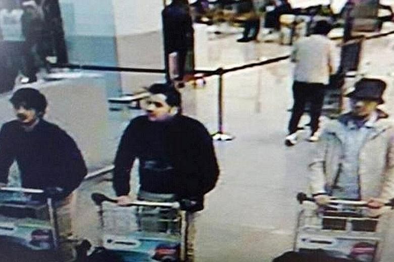 Of the three men caught on airport CCTV cameras, only Ibrahim el-Bakraoui has been identified, as the man in the middle.