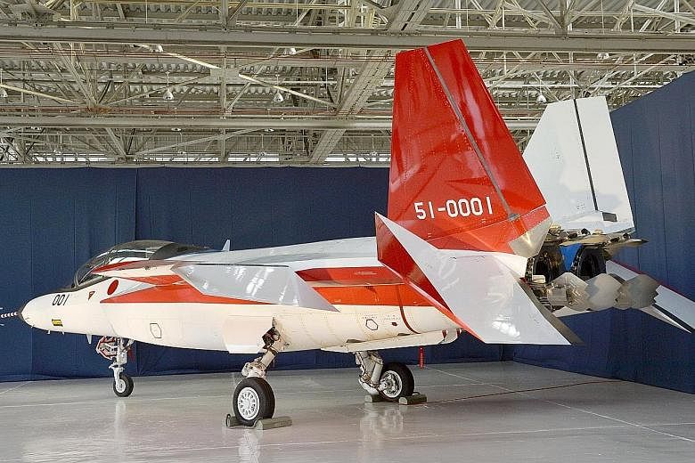 A prototype of the first Japan-made stealth fighter at a Mitsubishi Heavy Industries factory in Aichi prefecture. The ATD-X experimental aircraft is set to have its first test flights within days.