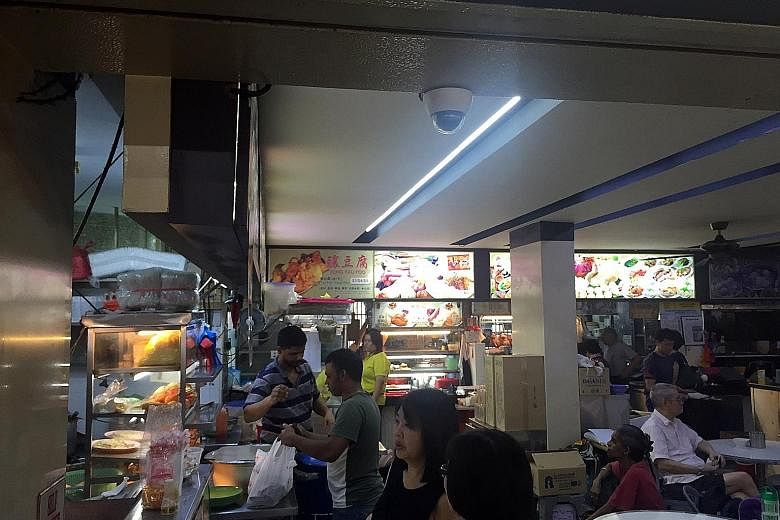 Chang Cheng Mee Wah Coffeeshop in Toa Payoh is one of about 400 coffee shops that have installed surveillance cameras (such as the one on the ceiling) as an added security measure in the wake of recent terrorist attacks in Europe.
