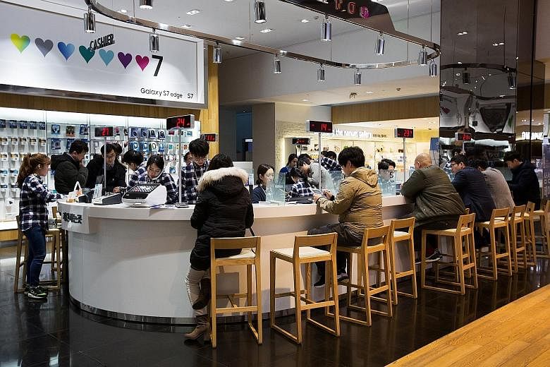A Samsung store in Seoul. Hurt by a rapid decline in smartphone profits and the absence of new businesses to drive growth, Samsung is reforming its military-style working culture to foster innovation.
