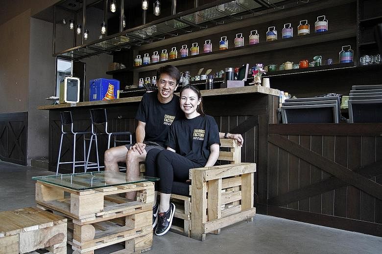 Mr Chiang and Ms Png at one of their pop-up eateries, Paella Place, in Somerset. A pop-up store costs them less than $20,000.