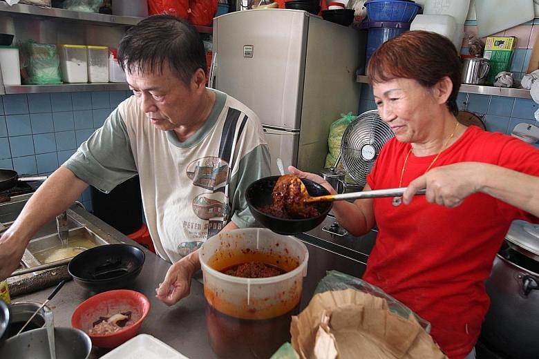 Mr Yap and his assistant, Madam Chong, hard at work at his MacPherson Minced Meat Noodles stall. His trademark bak chor mee dish has been rated by several food websites as among Singapore's best.