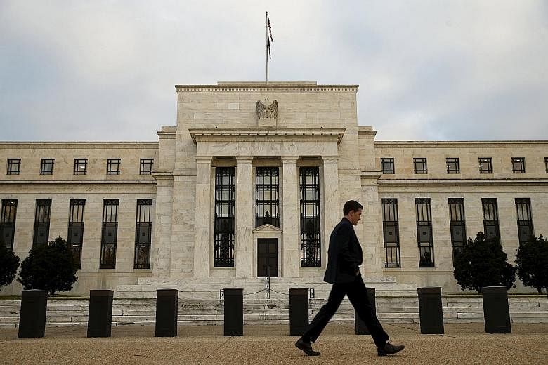 The US Federal Reserve building in Washington. Traders will likely keep watch on Fed chair Janet Yellen's speech at an event hosted by the Economic Club of New York tomorrow for possible clues to the timing of the next US rate hike.