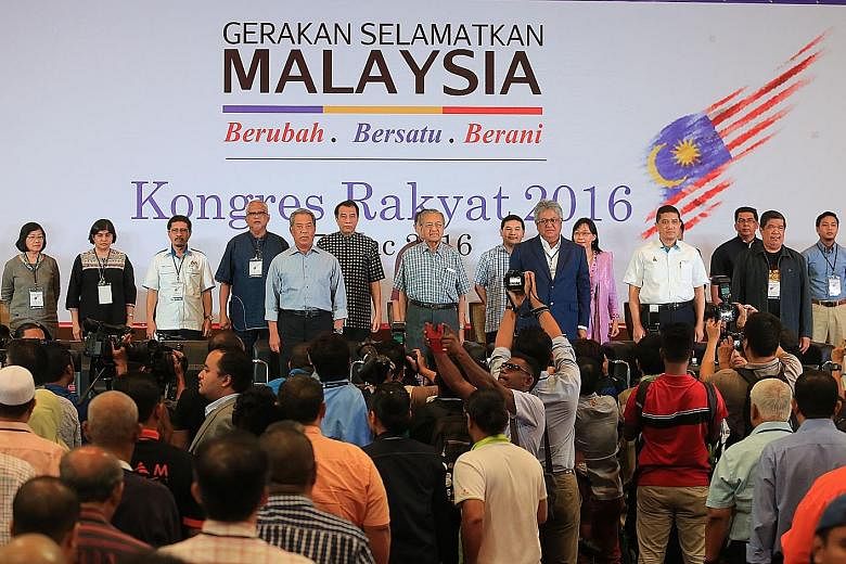Dr Mahathir flanked by sidelined Umno leaders, opposition politicians and political activists at the congress billed as Gerakan Selamatkan Malaysia, or the Save Malaysia Movement. The group will go around Malaysia till June to collect signatures from