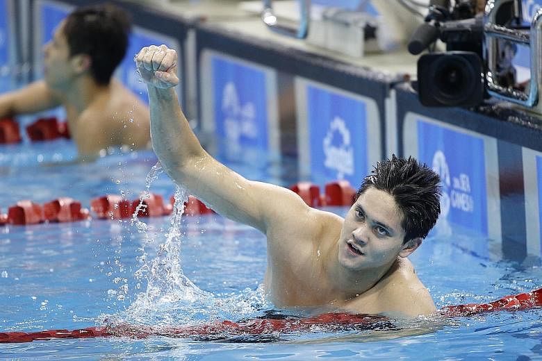 Joseph Schooling, seen here winning one of his nine golds at last year's SEA Games, broke his second NCAA record in the 200-yard butterfly event to snag his second individual gold at the meet.