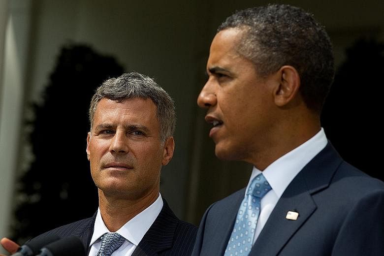 Prof Krueger with President Barack Obama in a 2011 photo. Prof Krueger's analysis of economic figures, polls and data on suicide bombers and hate groups found no link between economic distress and terrorism.