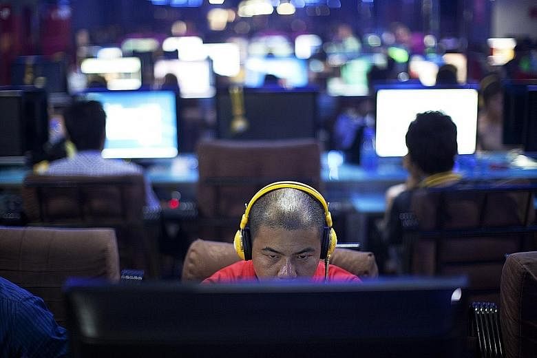 An Internet cafe in Beijing. The Chinese government plans to more strictly manage websites in the country in its latest push to set boundaries in the wider online sphere.