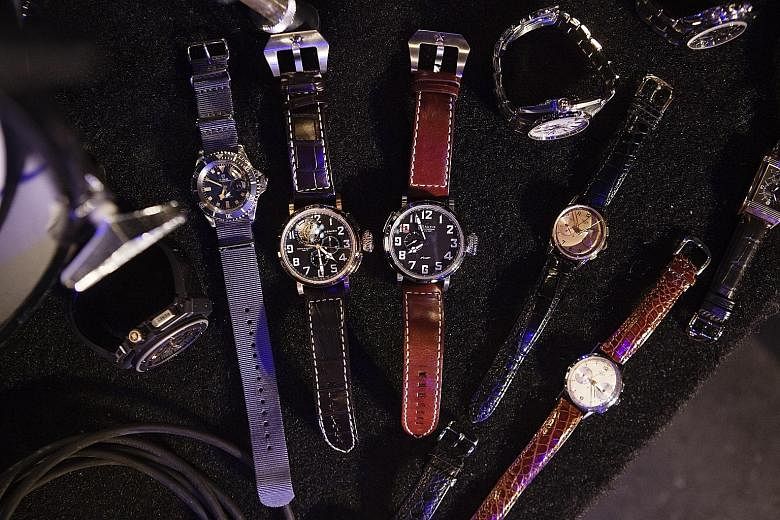 Kiss drummer Eric Singer (above) and some watches from his collection (left).