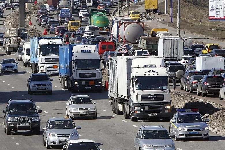 Trucks transporting spent highly enriched uranium on the road in Kiev, Ukraine, in this 2012 photo, under a two-year programme with the US and Russia to remove such material from the country.