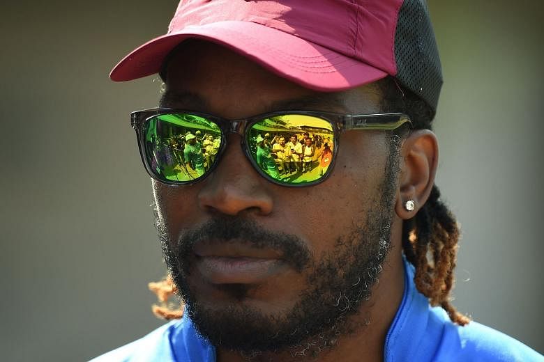 Danger men Virat Kohli of India, batting in the nets during training, and West Indies' Chris Gayle (above) are likely to be their respective sides' key men in the semi-final clash in Mumbai today. 