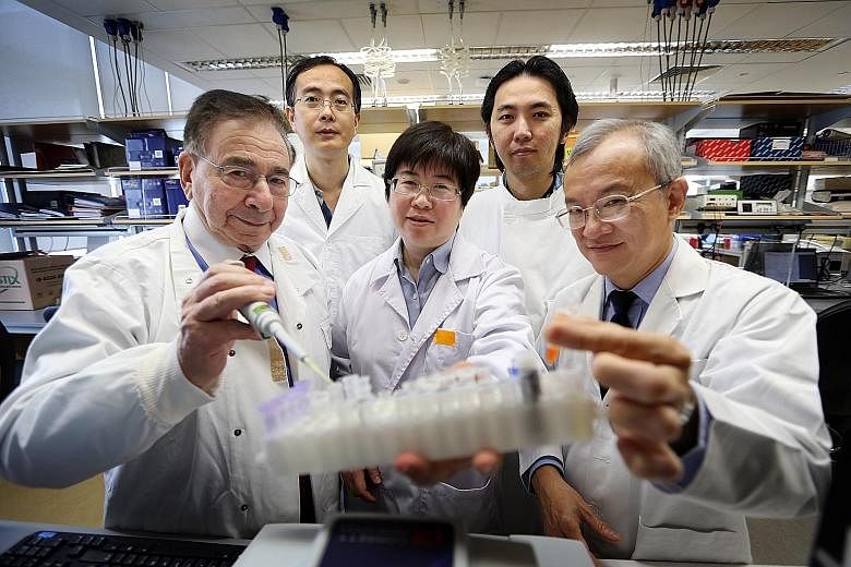 The team behind the research include (front row, from left) Sir Roy, Dr Gan Shu Uin and Professor Lee Kok Onn; (back row, from left) Dr Fu Zhen Ying and Dr Sia Kian Chuan. They have so far received around $3 million in grants for the project from the