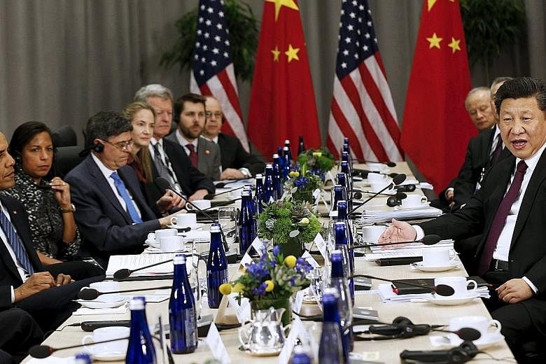 US President Barack Obama (left) meeting his Chinese counterpart Xi Jinping at the Nuclear Security Summit in Washington on Thursday. After the summit, leaders are expected to outline steps forward and issue action plans.