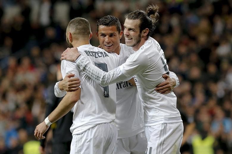 Real Madrid's BBC forward line of Gareth Bale (right), Karim Benzema and Cristiano Ronaldo will be eager for revenge when they face Barcelona at the Nou Camp, having been on the wrong end of a 4-0 trouncing earlier this term. 