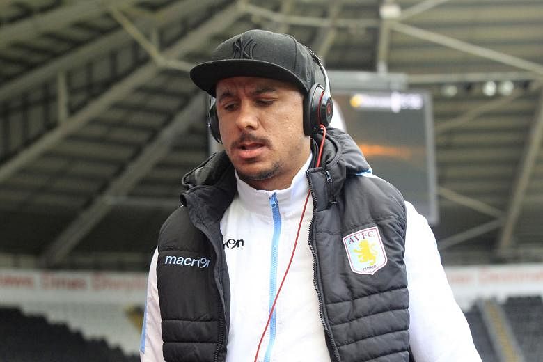 Gabriel Agbonlahor arriving at Villa Park for the game against Swansea last month. He has been dropped from the team by caretaker manager Eric Black for today's match against Chelsea.