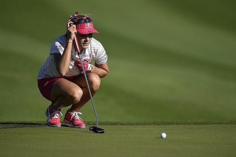 Lexi Thompson made a bold move overhauling her putting going into the year's first Major, and it paid off with the American grabbing a share of the halfway lead at the ANA Inspiration on Friday.