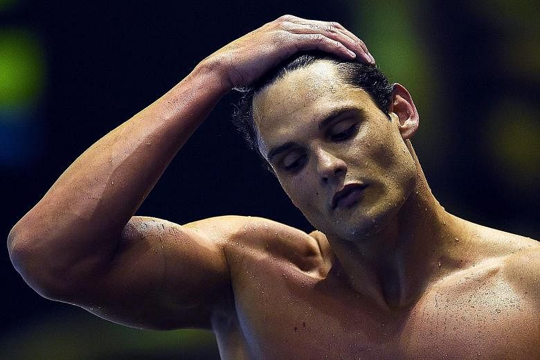 Florent Manaudou looking downcast after finishing third in the 100m free final at the French swimming championships on Friday.