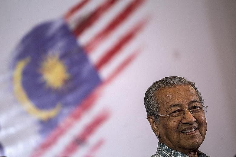 Dr Mahathir at an event of the Save Malaysia movement in Shah Alam, Selangor, last month. He acknowledges that the opposition is not very strong to helm the country and has problems. His key aim in working with it is to push Mr Najib out of office by