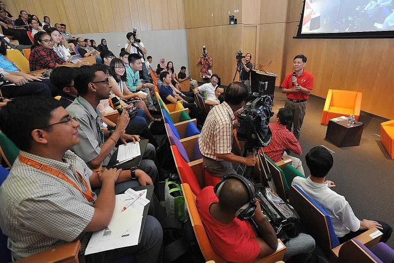 Minister in the Prime Minister's Office Chan Chun Sing at a dialogue with more than 200 young people during his visit to Geylang Serai ward in Marine Parade GRC yesterday. He said that how cohesive Singapore stays depends on whether people think in t