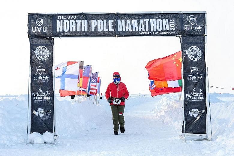 Last year, Ms Lau completed only 28km of the 42.195km marathon in the North Pole (above) as her shoes were soaked in the snow and she suffered frostbite when she removed her fogged-up goggles. She was the oldest participant then. This year, equipped 
