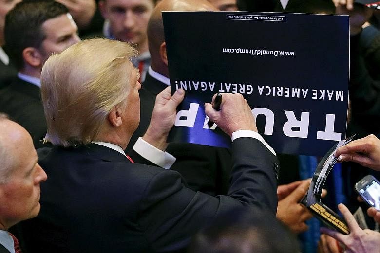 Mr Trump giving an autograph at a campaign event. A recent New York Times/CBS News poll shows Mr Trump has become unacceptable, perhaps irreversibly so, with broad sections of Americans.