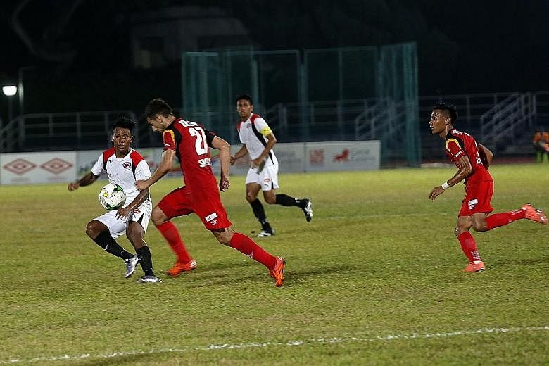 Balestier Khalsa's Smajovic Sadin (No. 27) going on the attack against Home United in their S-League football match at Toa Payoh Stadium last night. Ken Ilso's penalty, his third goal of the season, gave Home a 1-0 win over the second-last Tigers. At