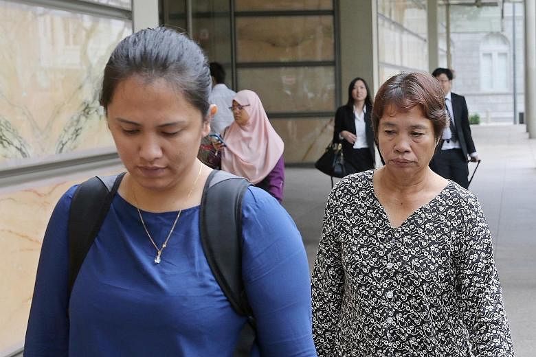 Ms Jumai Kho (far left) and Madam Lenduk Baling, the sister and mother of convicted murderer Jabing Kho (above) respectively, leaving the Supreme Court yesterday after the attempt to reopen his case and quash his death sentence was dismissed.