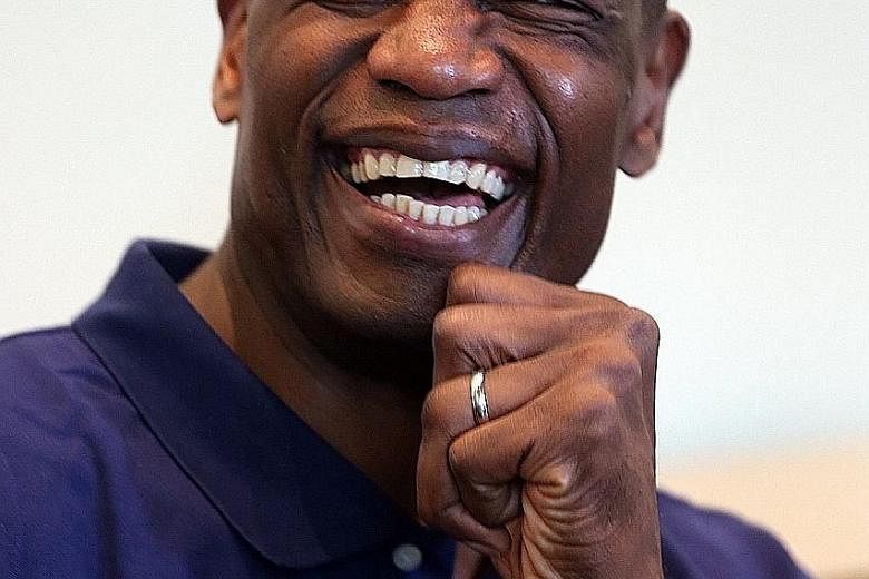 All smiles for National Basketball Association Hall-of-Famer Dikembe Mutombo, who is in Singapore for the second meeting of the Jr NBA Asia Advisory Council.